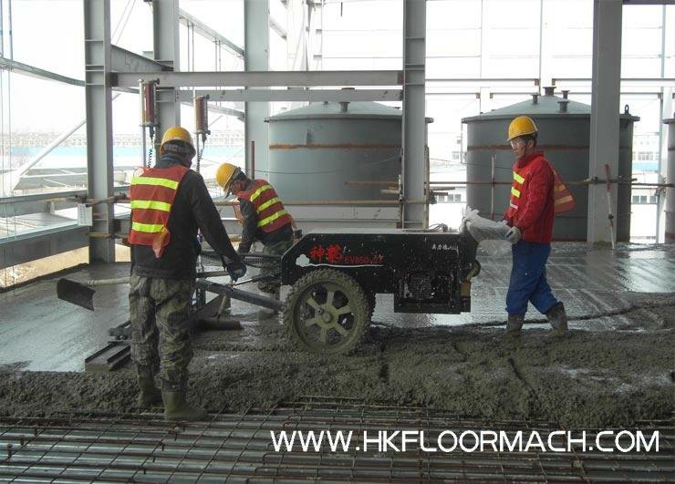Mini laser screed machine used on the steel mesh