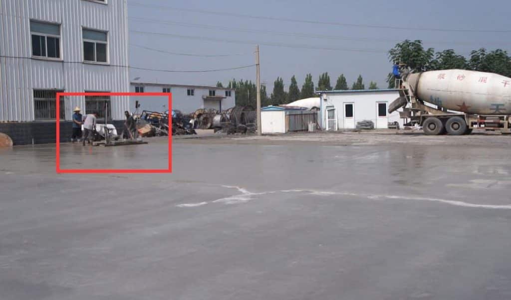 Working picture of the walk behind laser screed